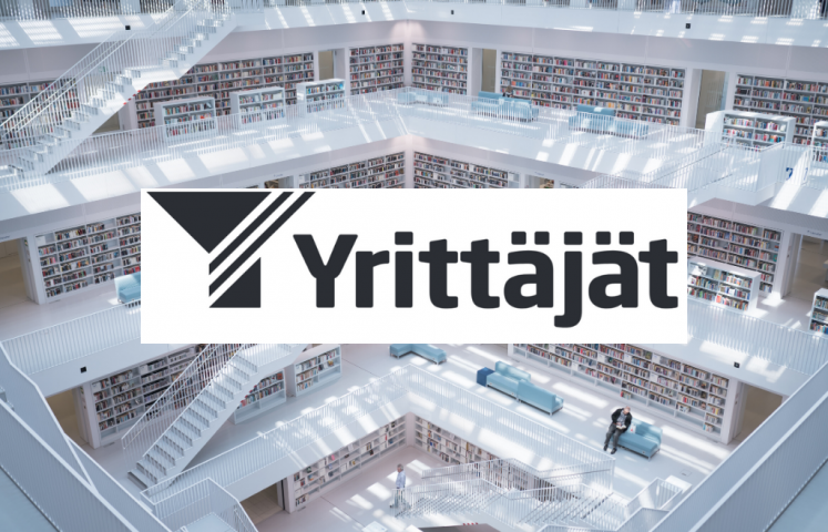 Näkymä suuresta kirjastosta ja Yrittäjien logo.