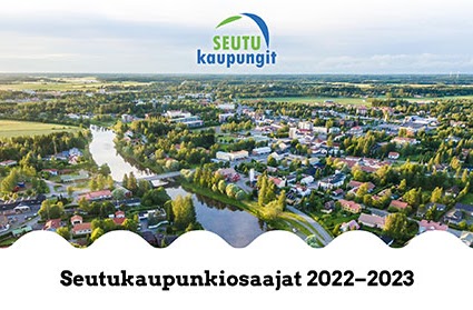 Kuva: Seutukaupunkiosaajat. Ilmakuva vehreästä seutukaupunkimaisemasta.